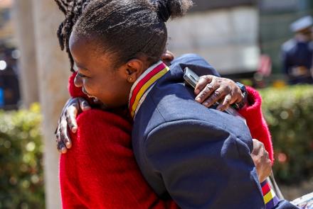 A moment of joy and pride as guests and family reunite with recruits following the successful completion of basic  training at  the National Police College, Kiganjo .